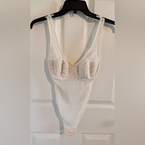 Elegant Lace Trimmed Cream/White Bodysuit